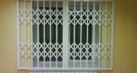 Раздвижные металлические решетки на окна