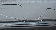 Типичная трещина стекла в стеклопакете